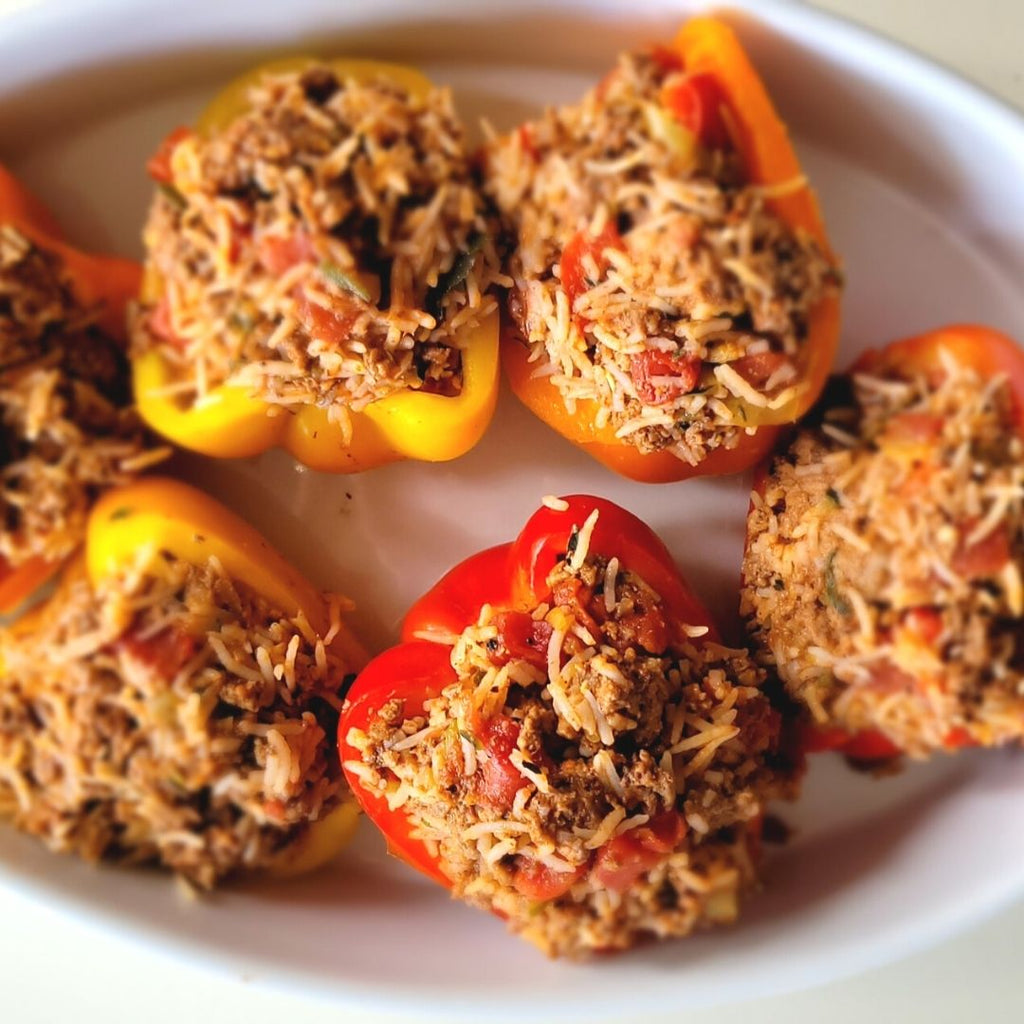 Bison Stuffed Peppers in white dish.