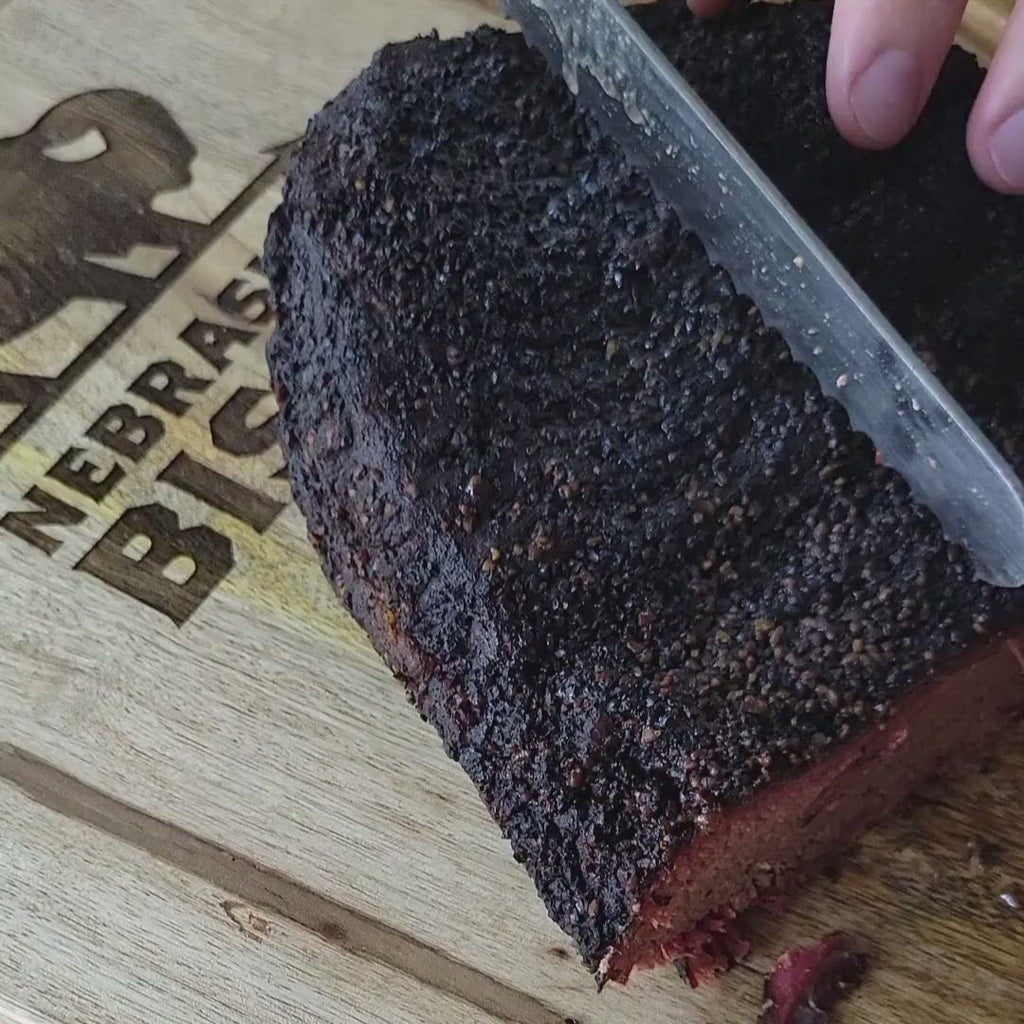 cutting a bison brisket.