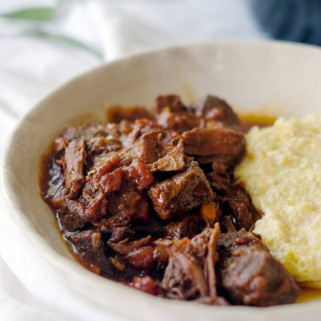 Cooked Bison Roast in bowl.