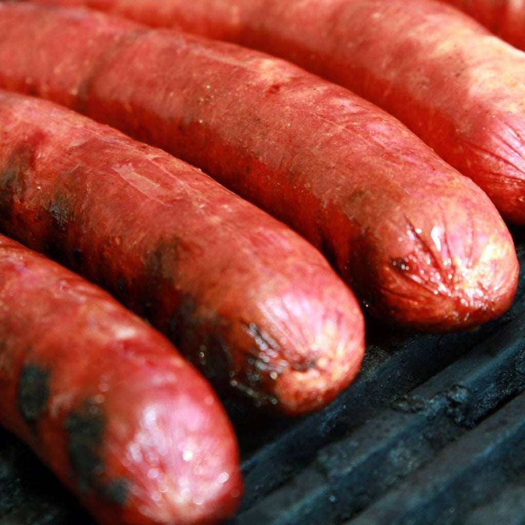 Elk brats, close up shot on the grill.